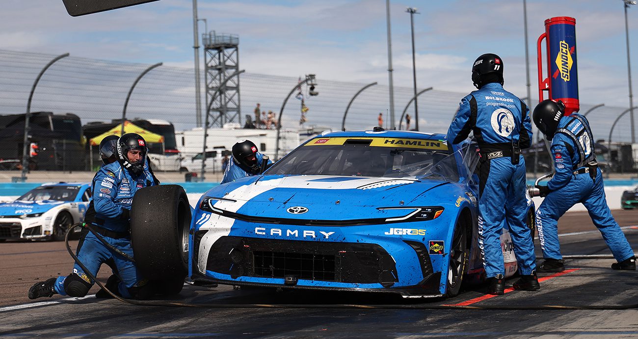 Denny Hamlin makes a pit stop at Phoenix Raceway in the NASCAR Cup Series.
