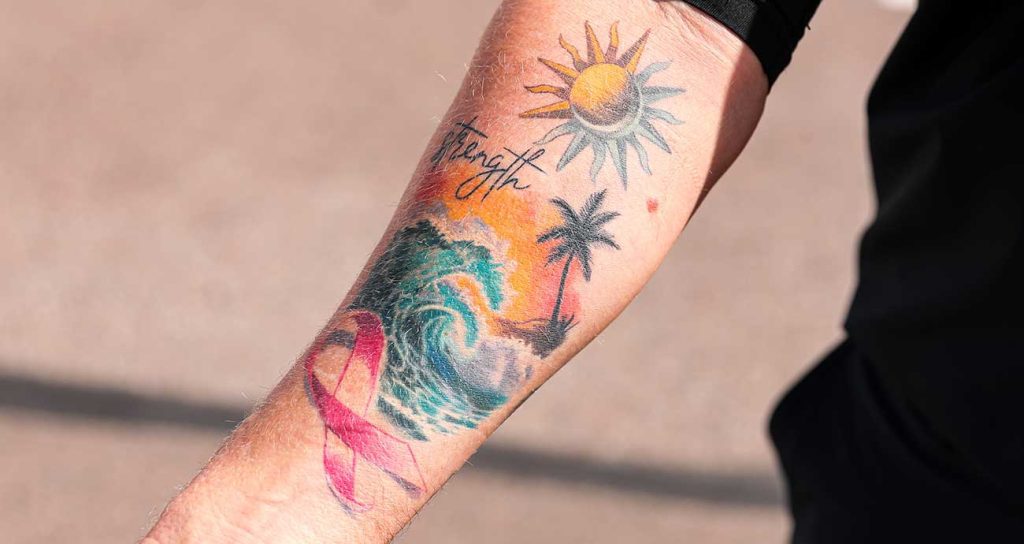 Detail of the tattoos of No. 45 fueler Brian Dheel at Phoenix Raceway