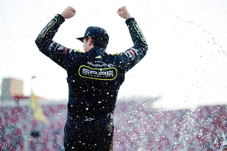 Sammy Smith celebrates his win at Talladega.