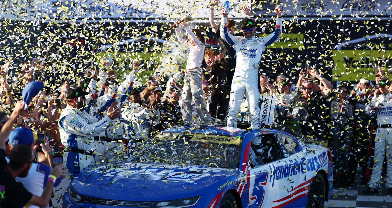 Kyle Larson celebrates in Victory Lane.