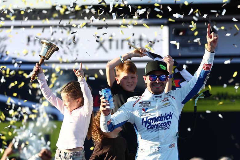 Kyle Larson and his kids celebrate.
