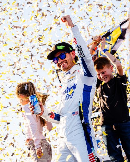 Kyle Larson celebrates.