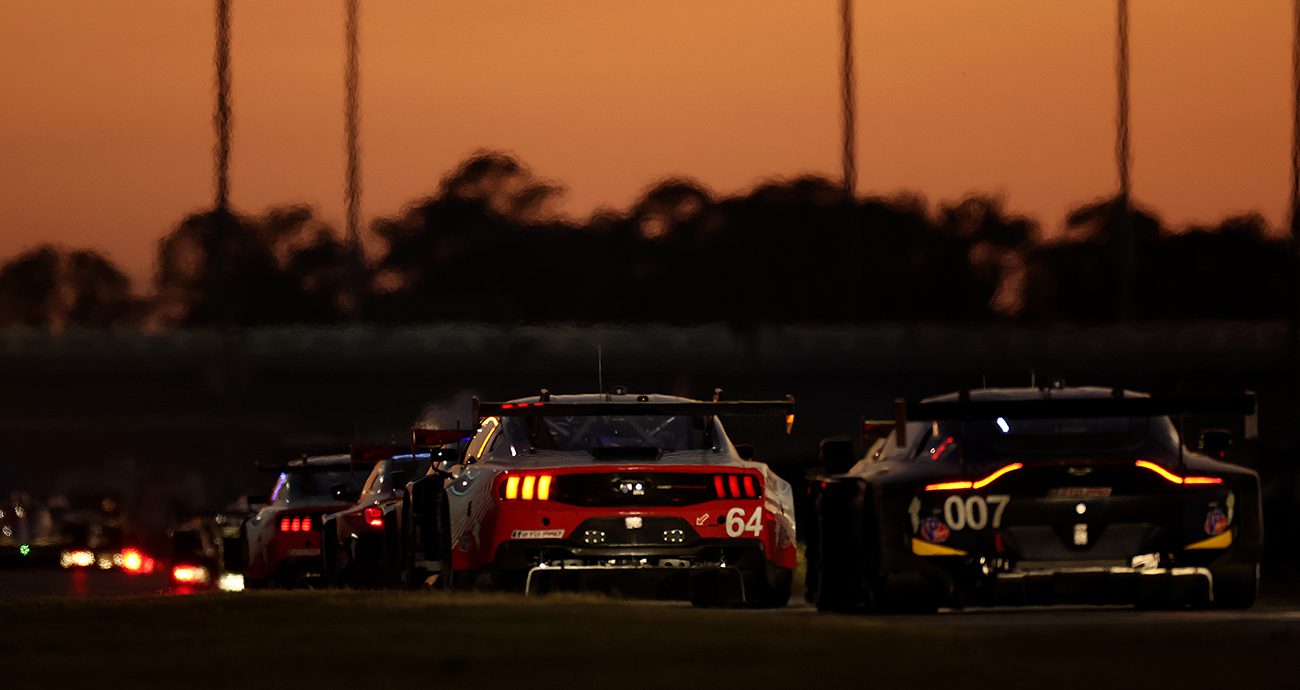 Sports cars race at Daytona International Speedway.