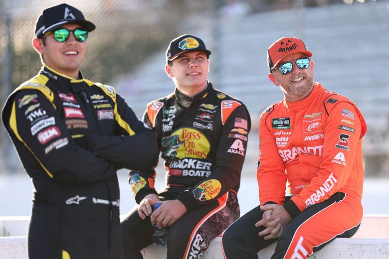 Sammy Smith, Carson Kvapil and Justin Allgaier look on.