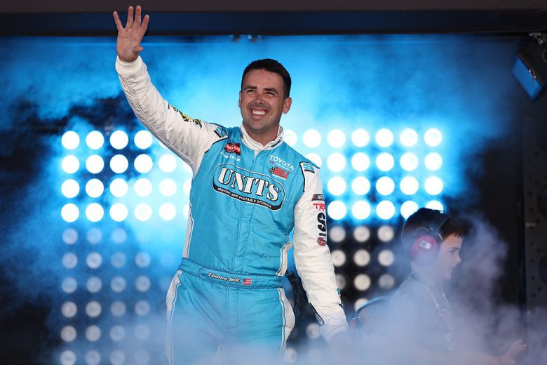 Timmy Hill waves to fans.