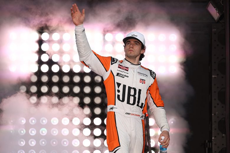 Gio Ruggiero waves to fans.