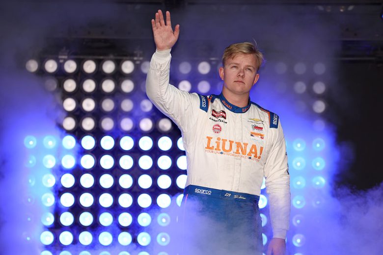 Tyler Ankrum waves to fans.