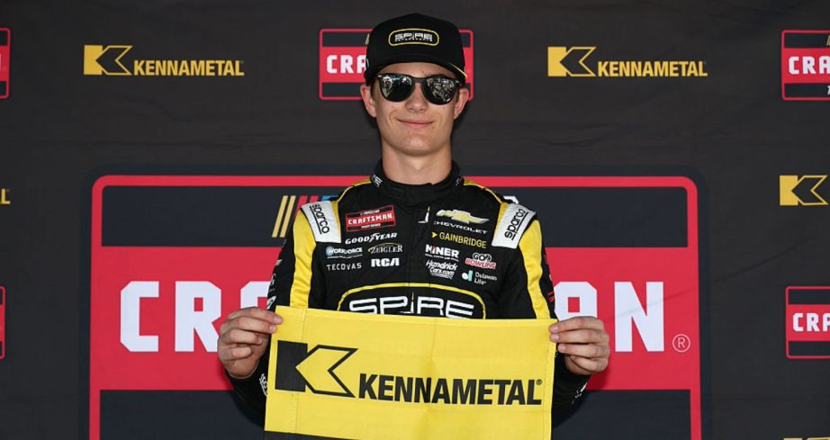 Tristan McKee celebrates after winning the pole at Martinsville.