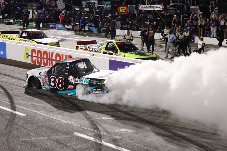 Chandler Smith does a burnout at Martinsville.